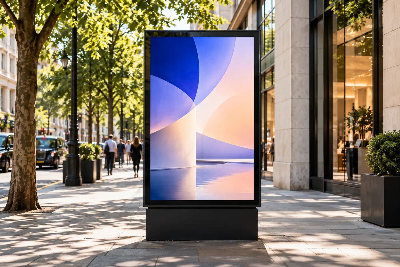 A street-level advertising display on a walkable urban pavement