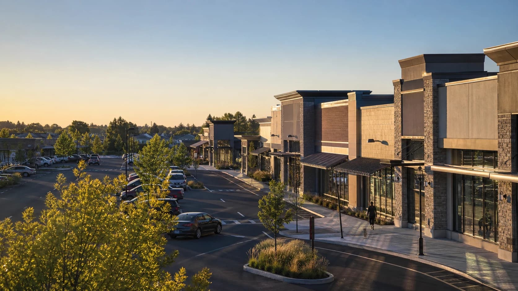 Hyperrealistic US retail corridor with neighbourhood shopping centres and access roads at golden hour